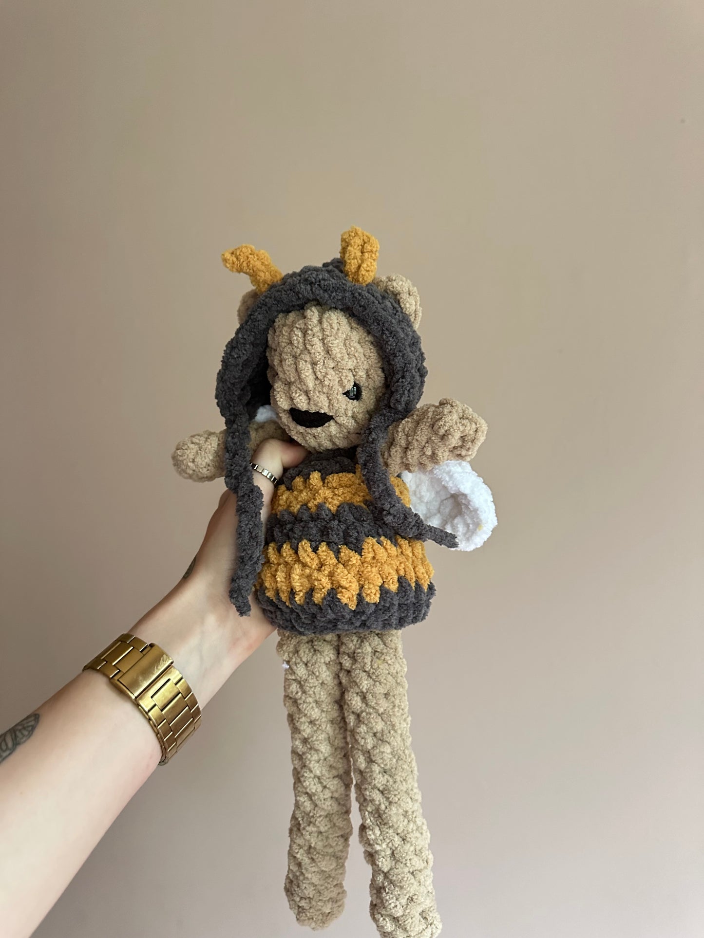 Crochet bear in bee outfit